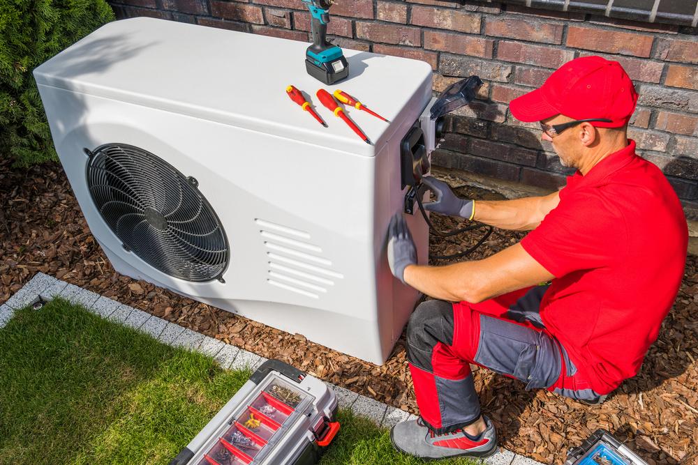 Technician working on a heatpump - copyright iStock-1438135787